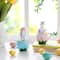 Glitzhome® Set of 2 Easter Resin Bunny on Tulip Mug Table Decor